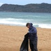 Volunteers from USS Indianapolis (LCS 17) participate in beach clean up