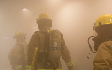 180FW Fire Fighters Fight Through The Smoke During Readiness Exercise