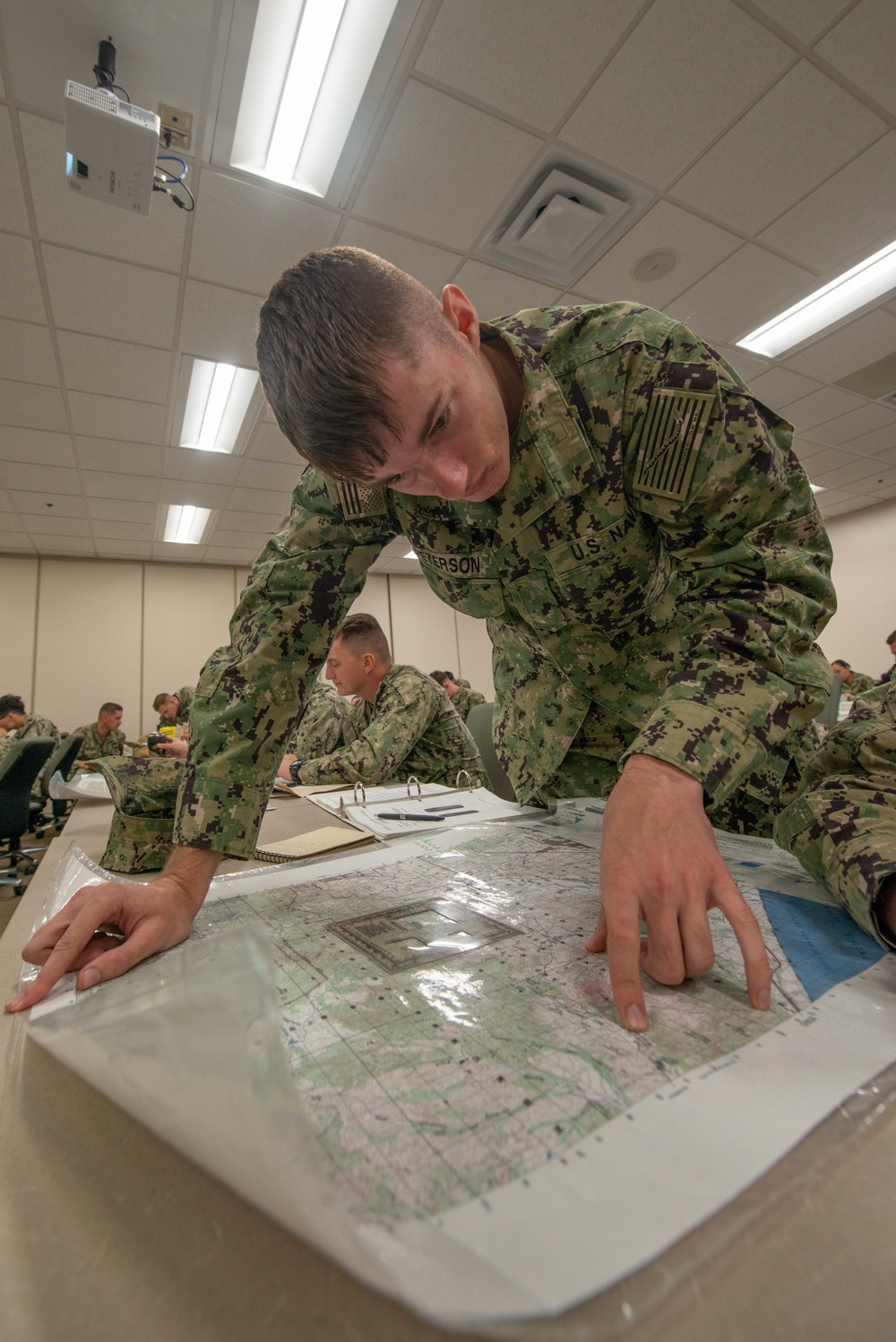 NMCB 11 Seabees Study Land Navigation