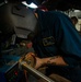 Sailor Grinds Pipe Welds