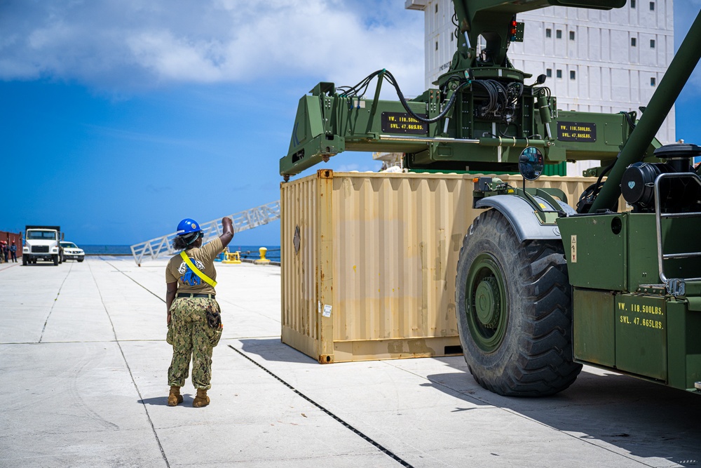 Navy Cargo Handlers Offload Ammunition