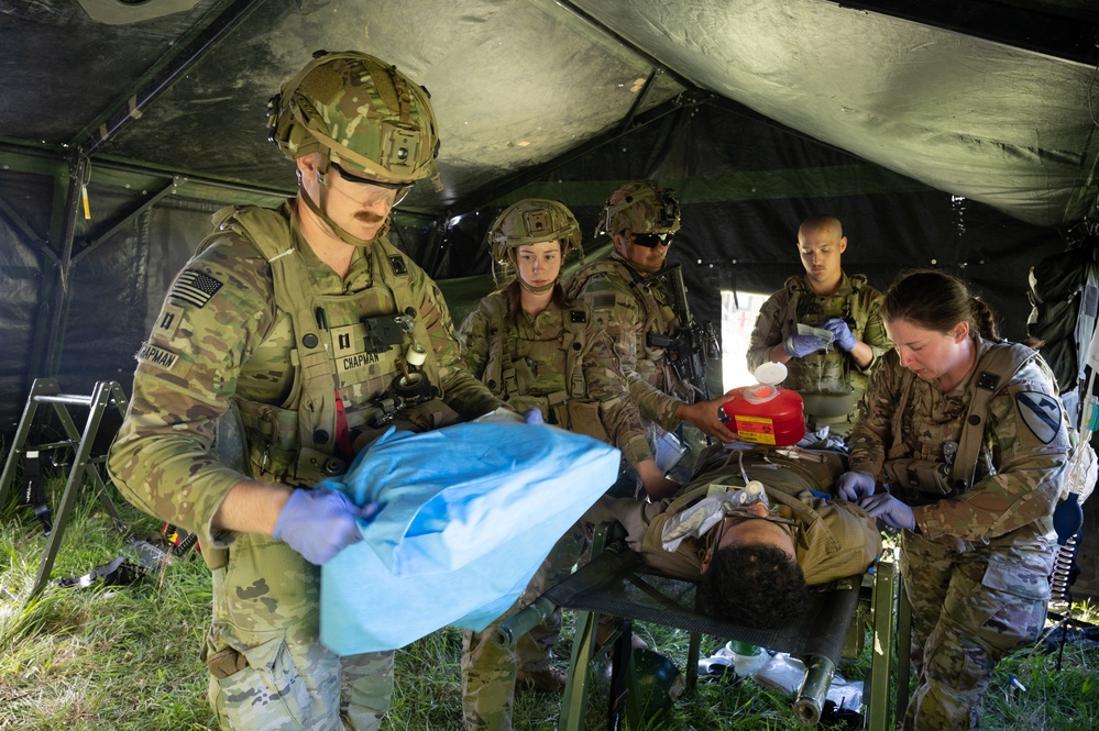 1st Cavalry Regiment Soldier Provides Medical Care to Simulated Casualty