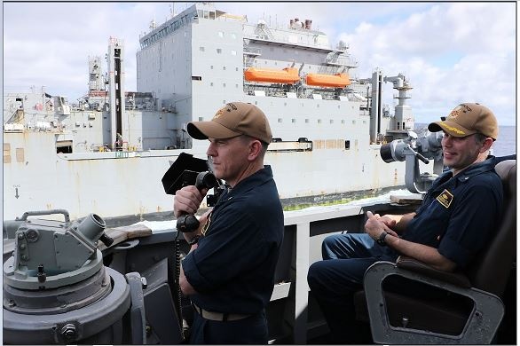 CDR D.R. Tourtelotte and LCDR T.M. Winters during an Underway Replenishment