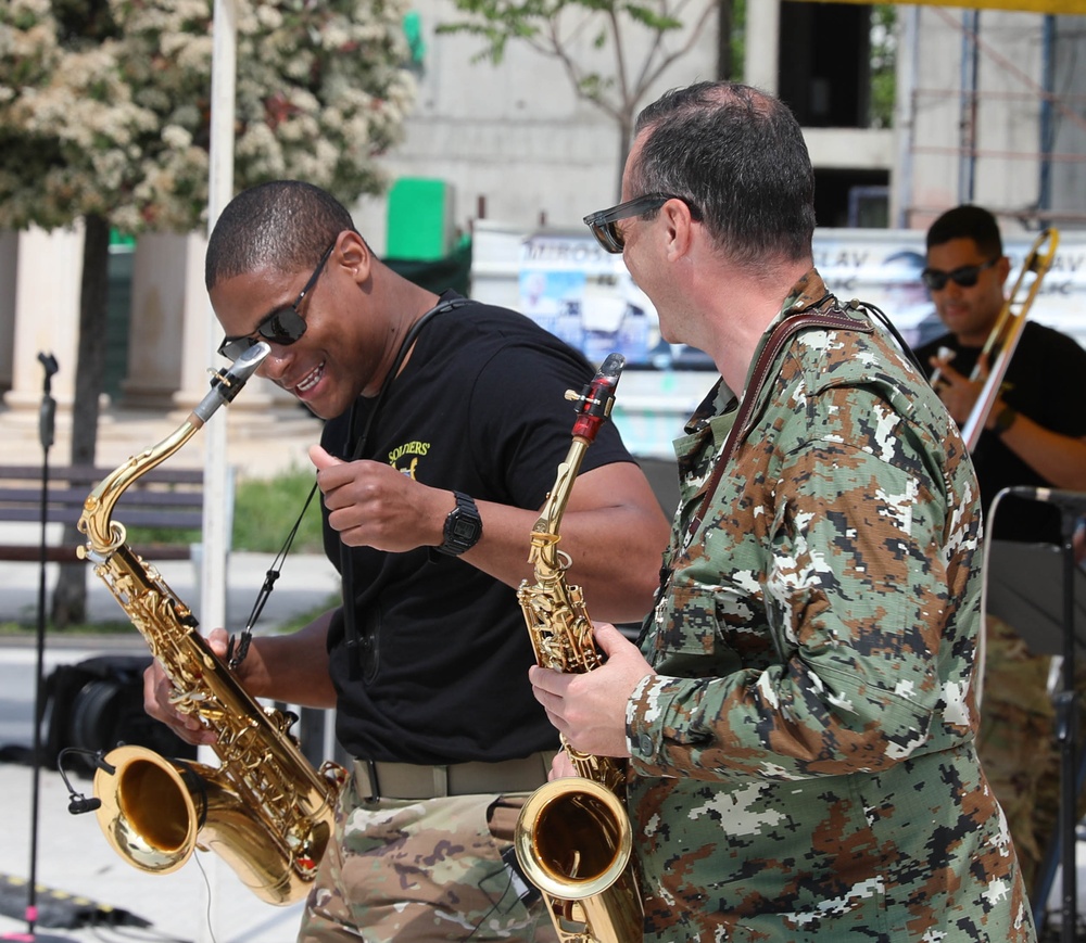 U.S. Army Sgt. Wes Philips plays a concert with North Macedonian Maj. Trajche Davkov