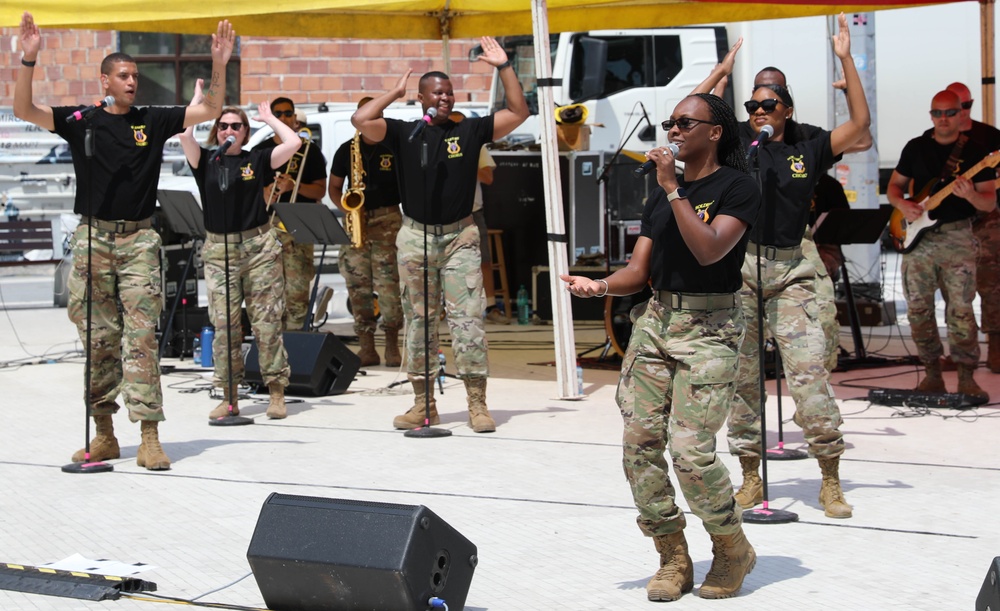 U.S. Army Soldiers assigned to U.S. Army Europe and Africa Band and Chorus sing at a concert