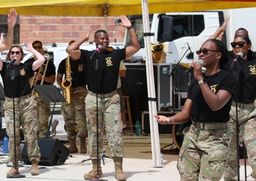 U.S. Army Soldiers assigned to U.S. Army Europe and Africa Band and Chorus sing at a concert