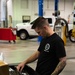 Niagara Airman selects tools for an oil change at Aviano Air Base