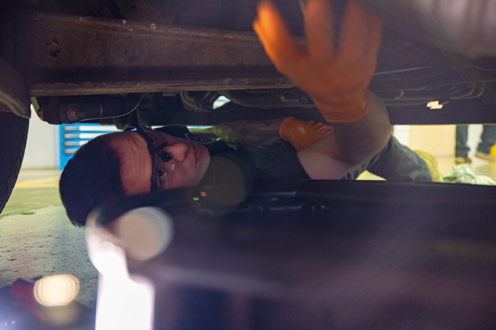 914th Airman changes oil in Ford F-350