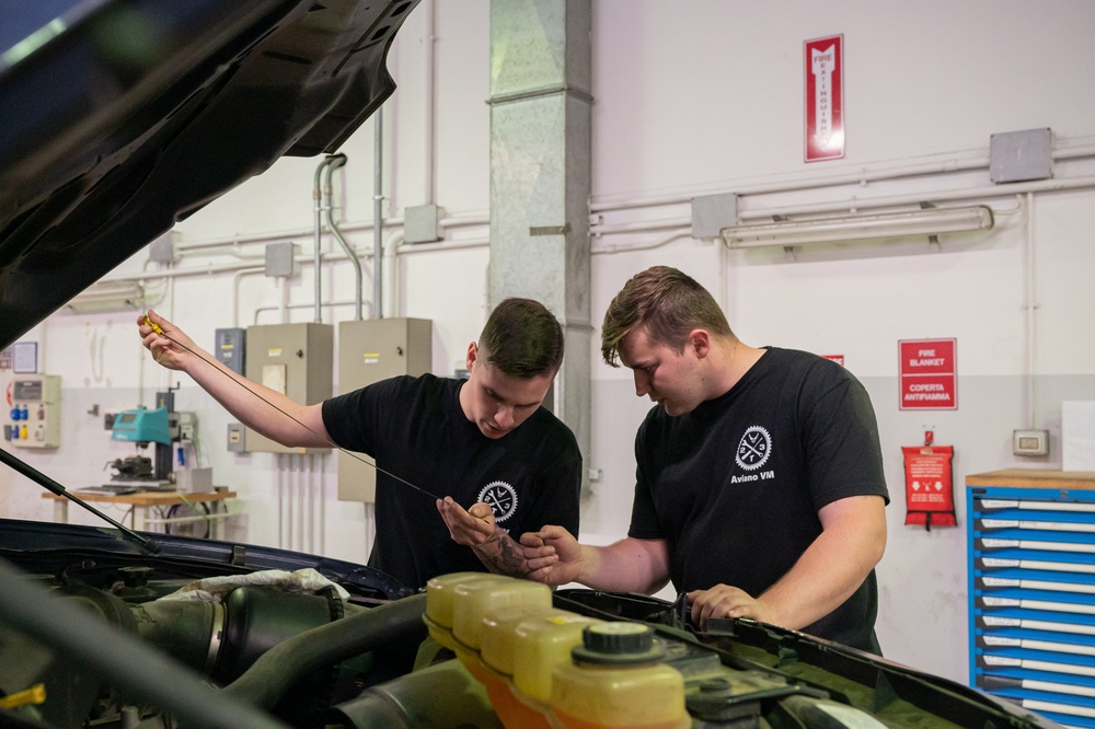Niagara and Aviano Airmen work together for a preventative maintenance inspection