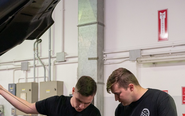 Niagara and Aviano Airmen work together for a preventative maintenance inspection
