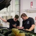 Niagara and Aviano Airmen work together for a preventative maintenance inspection