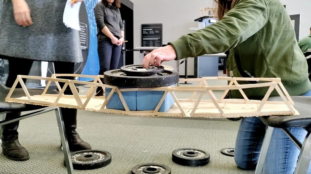 Students show off their engineering skills at Navy Bridge Building Challenge