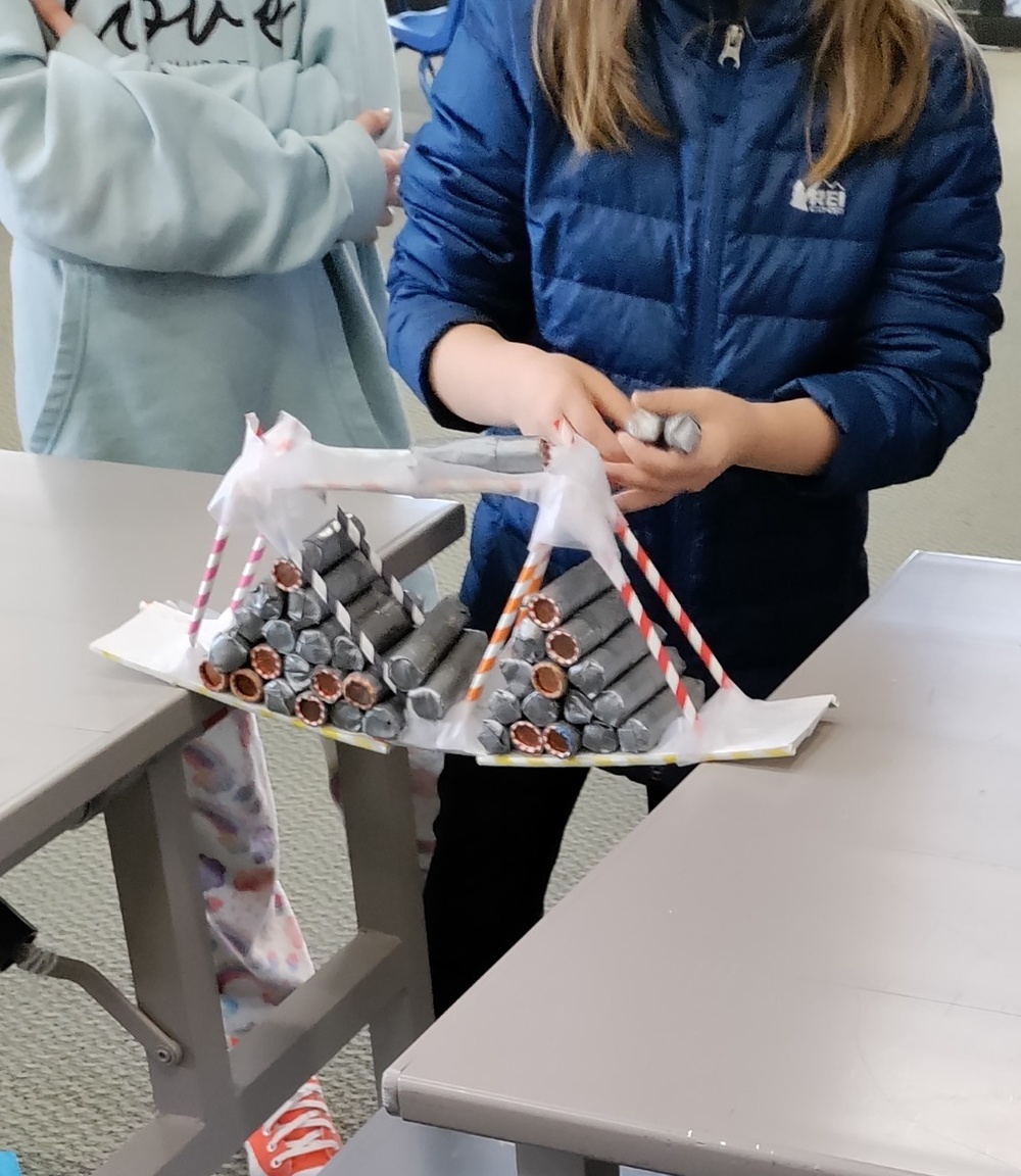Students show off their engineering skills at Navy Bridge Building Challenge
