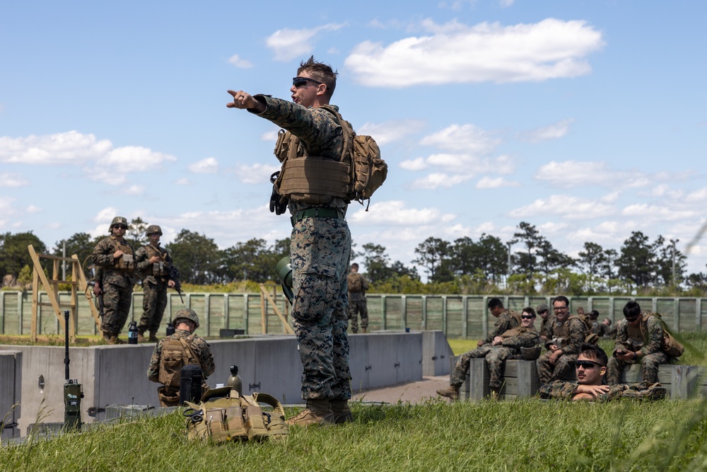 Marines shoot during Mission Rehearsal Exercise 1-23