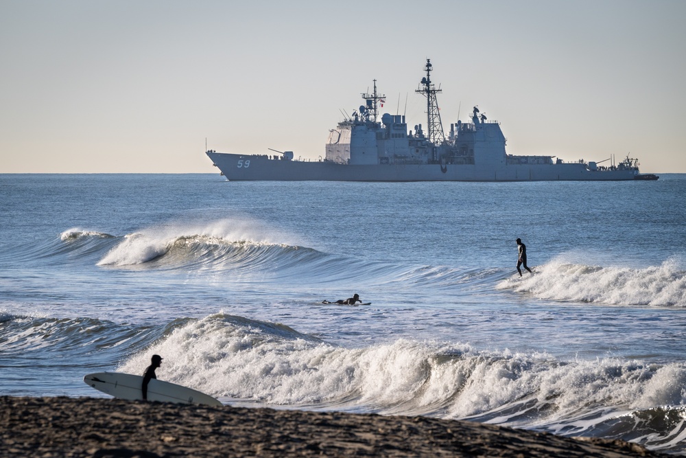 USS Princeton (CG 59) Creates a Dramatic Backdrop Approaching Naval Surface Warfare Center, Port Hueneme Division