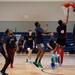 Abraham Lincoln Sailors play basketball during the Battle of the Carriers