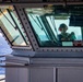 Sailors Clean Windows On The Bridge