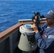 USS Ramage Sailor Takes Navigational Measurements