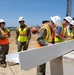 OICC Florence participates in construction milestone