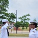 CTTSN Trent Gilliam salutes his mother LT Deshawnda Gilliam after graduating Navy Bootcamp.