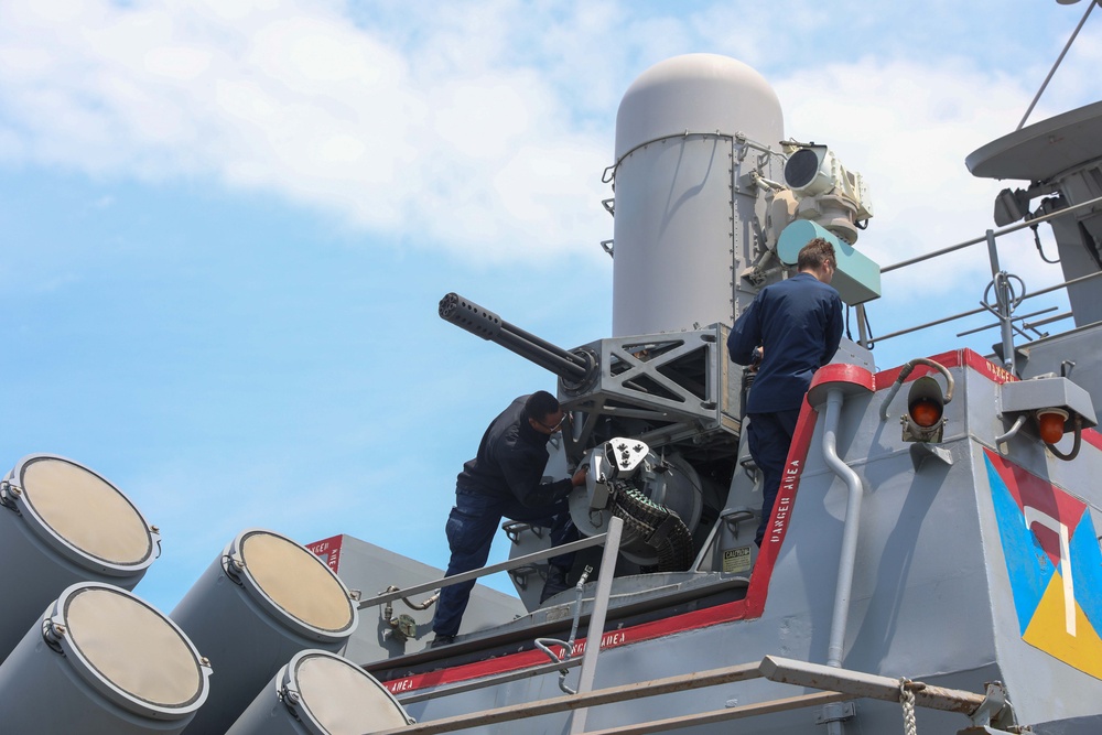 USS Ramage Sailors Work On CWIS