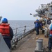 USS Ramage Sailor Fires Shot Line