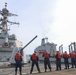 USS Ramage Sailors Holding the Phone and Distance Line