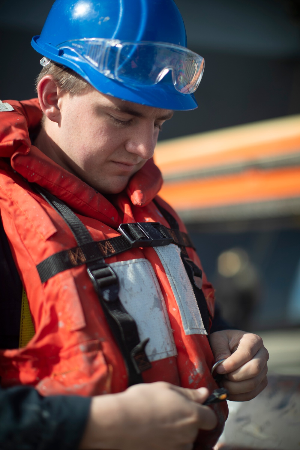 USS Tripoli Sailors Continue To Paint The Ship’s Hull During SRA