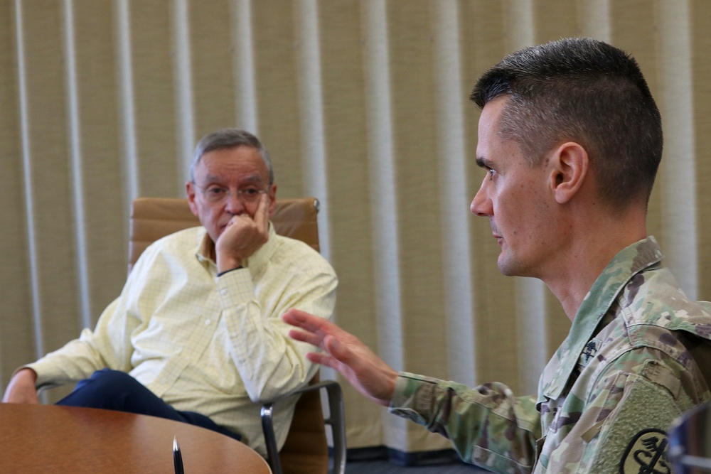 Col. Taylor talks with Dr. Martinez-Lopez