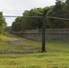 A brown tree snake deterrent fence marks the boundaries of the 130-acre habitat management unit within the bounds of Andersen Air Force Base