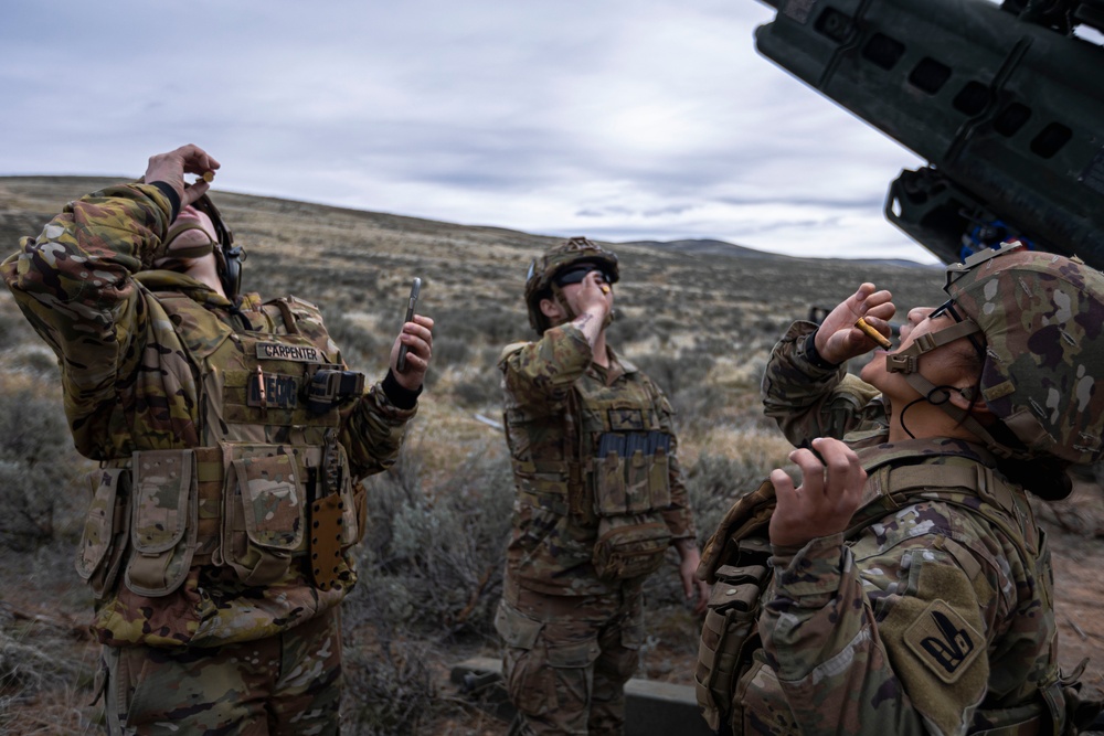 Fires in the Field: Washington National Guard field artillery crew take the primer shot