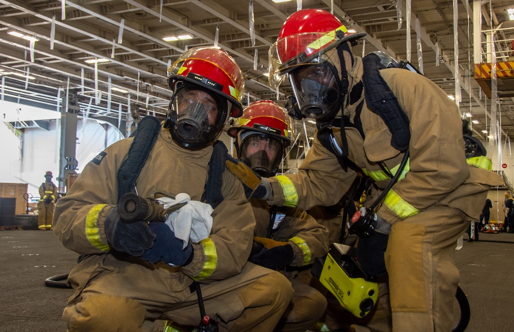 USS Ronald Reagan (CVN 76) Sailors participate in general quarters