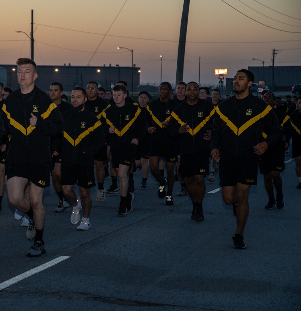 CSM Raby conducts PT with junior enlisted Soldiers