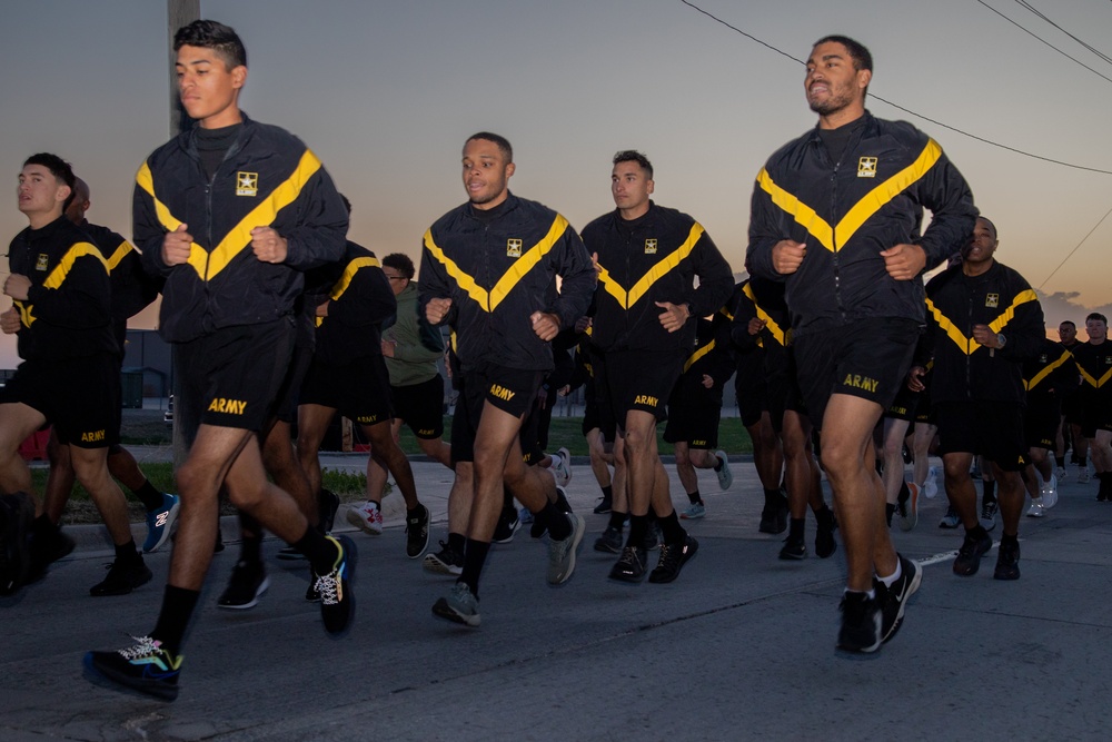 CSM Raby conducts PT with junior enlisted Soldiers