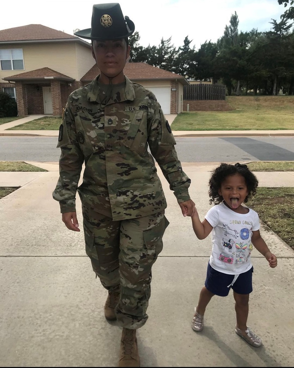 US Army MSG Ana Joachin and child