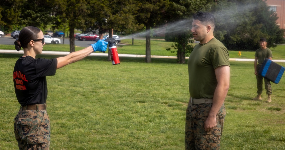 Legal Services particpate in OC spraying event