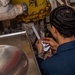 USS Ronald Reagan (CVN 76) conduct water heater maintenance