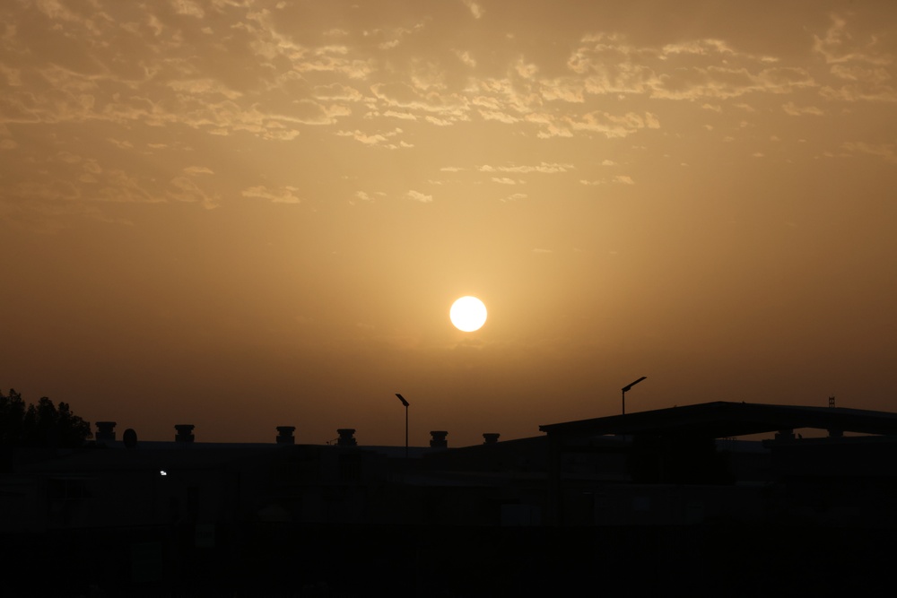 Sun sets over Camp Arifjan, Kuwait, May 2023