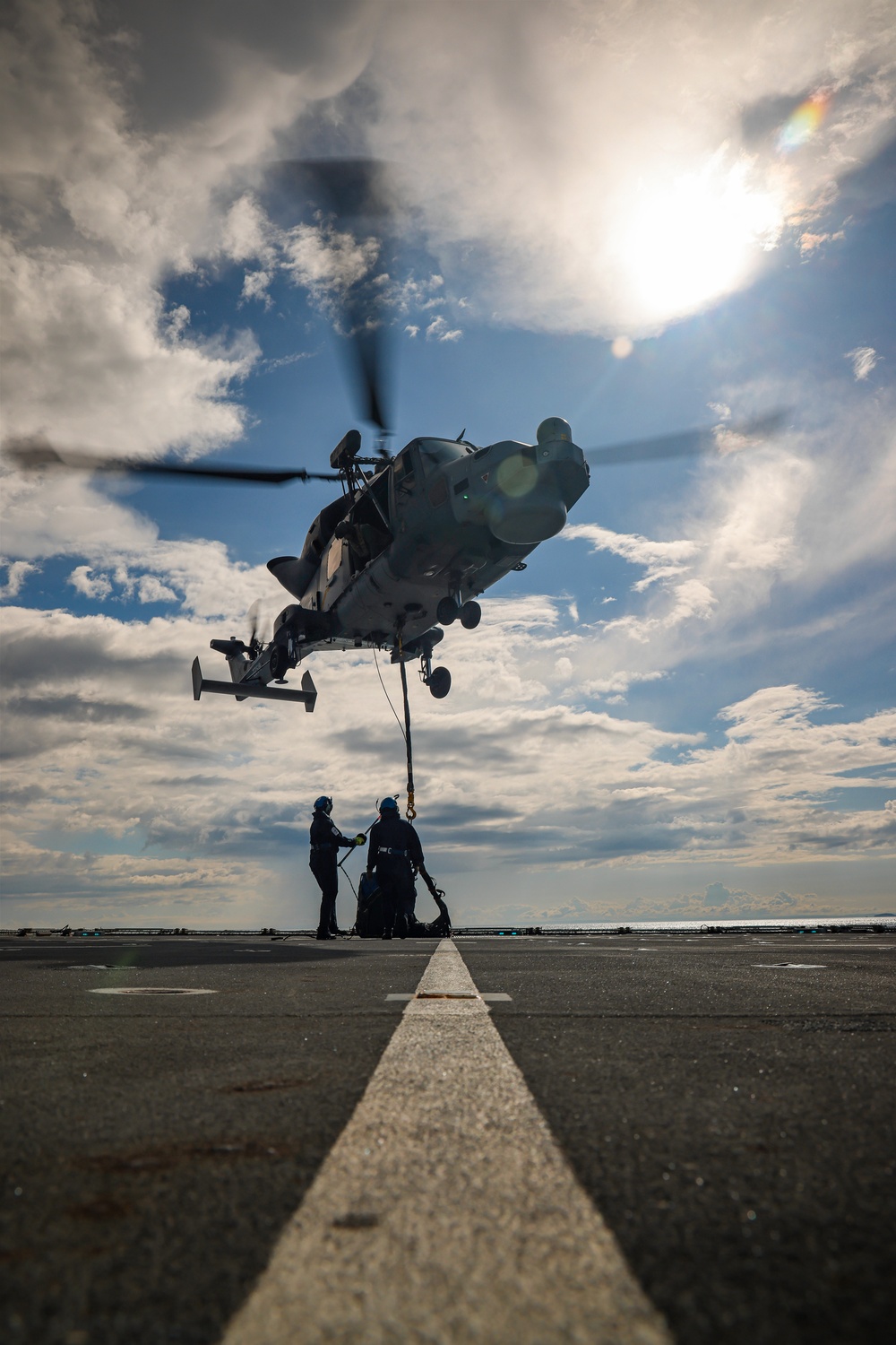 Wildcat lifting and winching on HMS Defender