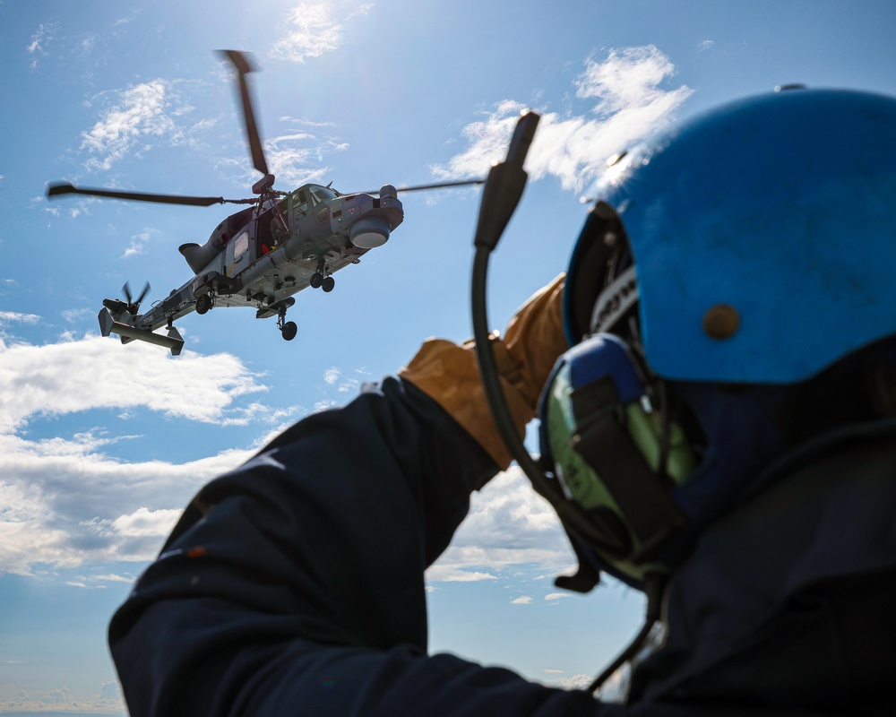 Wildcat lifting and winching on HMS Defender