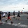 Sailors Play Football On The Flight Deck During Steel Beach Picnic
