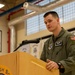 Airman thanks Yokota educators for 50 years of service with combat flag