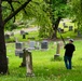 Airmen clean-up local cemetery