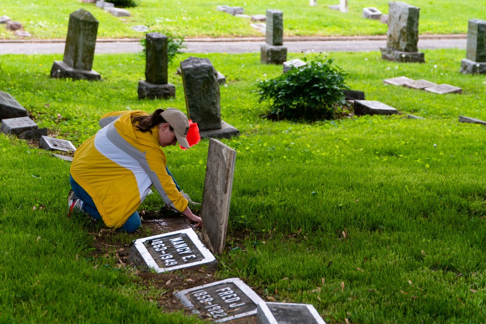 Airmen clean-up local cemetery
