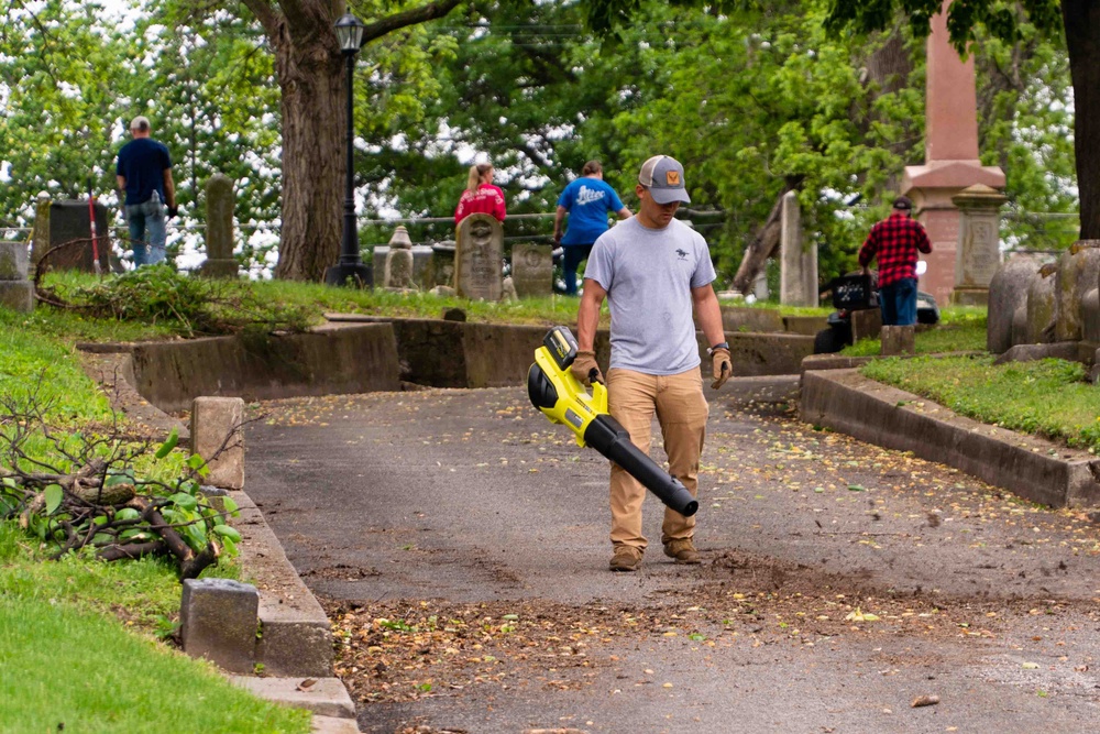 Airmen clean-up local cemetery