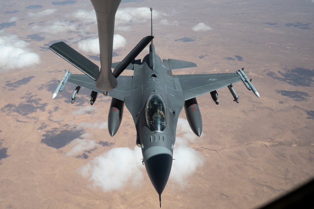 KC-135 Stratotanker crew conduct ACE operations, refuel F-16 Fighting Falcon