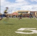 Abraham Lincoln Sailors play football during the Battle of the Carriers