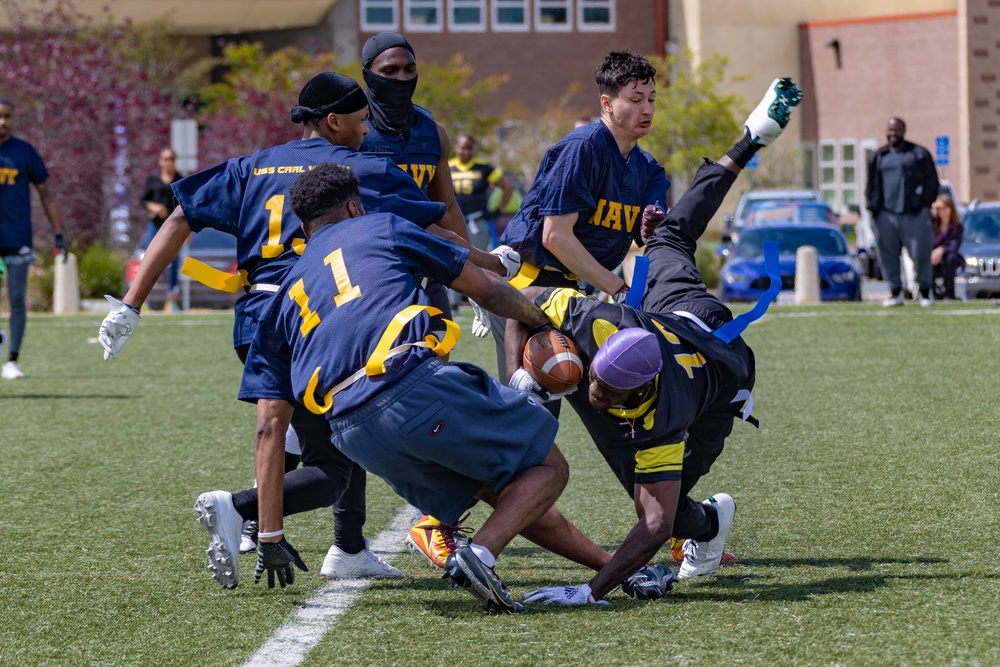 Abraham Lincoln Sailors play football during the Battle of the Carriers