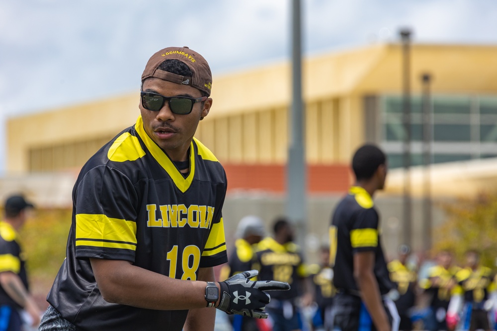 Abraham Lincoln Sailors play football during the Battle of the Carriers