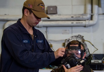 USS Carl Vinson (CVN 70) Conducts chemical, biological, radiological (CBR) fit tests